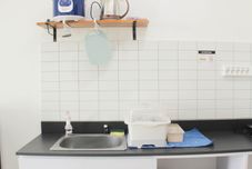 Ruang Umum Nice and Fancy Studio Apartment at Sayana Bekasi By Travelio