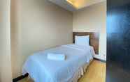 Bedroom 2 Comfy and Spacious 2BR at Braga City Walk Apartment By Travelio