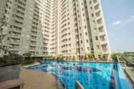 Swimming Pool Serene and Cozy 2BR Apartment at Parahyangan Residence By Travelio