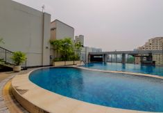 Swimming Pool 7 Comfort and Simple 2BR with Extra Room at MT Haryono Square Apartment By Travelio