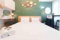 Bilik Tidur Homey and Warm Studio at Vida View Makassar Apartment By Travelio