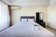 Kamar Tidur Cozy Studio at Beverly Dago Apartment By Travelio