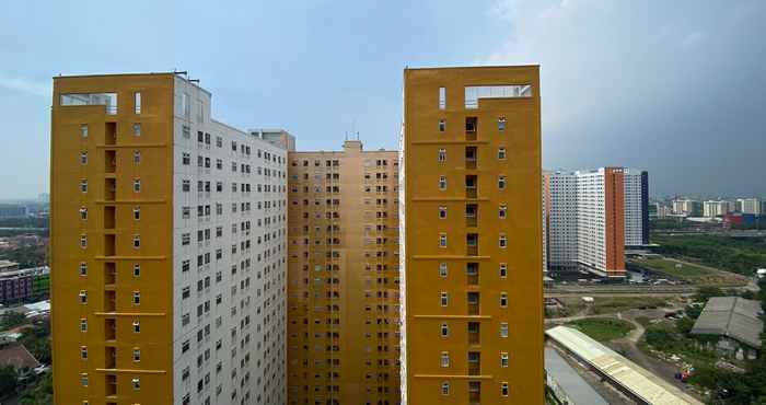 Exterior Comfy and Best Deal 2BR at Green Pramuka City Apartment By Travelio