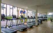 Fitness Center 3 Elegant and Warm 1BR at Gold Coast Apartment By Travelio
