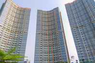 Lobi Elegant and Warm 1BR at Gold Coast Apartment By Travelio