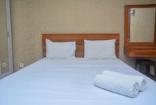 Bedroom Comfort Studio Room Apartment at Kebagusan City By Travelio