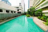 Swimming Pool Elegant Studio Room at Capitol Park Residence Apartment By Travelio