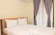 Kamar Tidur 4 Comfort and Simple 2BR at Meikarta Apartment By Travelio