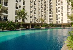 Swimming Pool 2 Cozy and Nice 2BR at Cinere Resort Apartment By Travelio