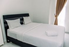 Bedroom 2 Fully Furnished 2BR at Akasa Pure Living BSD Apartment By Travelio