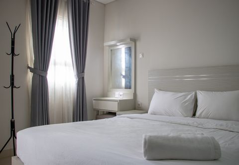 Bedroom Minimalist 1BR at Atlanta Residences Apartment By Travelio