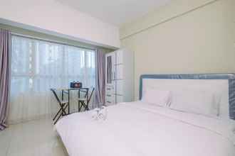 Bedroom 4 Minimalist and Comfy Studio at Springlake Summarecon Bekasi Apartment By Travelio