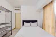 Bedroom Homey and Nice 1BR Apartment at M-Town Residence By Travelio