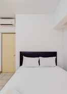 BEDROOM Homey and Nice 1BR Apartment at M-Town Residence By Travelio