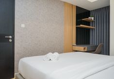 臥室 2 Homey and Nice 1BR at Branz BSD City Apartment By Travelio