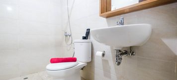In-room Bathroom 5 Elegant and Fully Furnished 2BR Apartment Mustika Golf Residence By Travelio