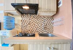 Common Space 4 Serene and Spacious Studio Room Apartment at Jarrdin Cihampelas By Travelio