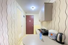 Ruang Umum Bright Studio Room Tamansari Panoramic Apartment By Travelio