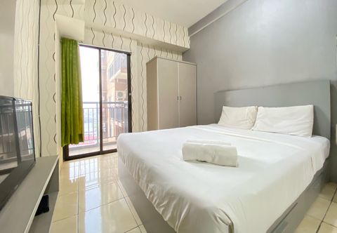Bilik Tidur Bright Studio Room Tamansari Panoramic Apartment By Travelio