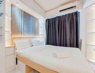 Kamar Tidur 2 Cozy and High Floor Studio Room at Sky House BSD Apartment By Travelio