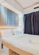 BEDROOM Cozy and High Floor Studio Room at Sky House BSD Apartment By Travelio