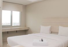 Bedroom 2 Nice Studio Apartment at Gateway Park LRT City Bekasi By Travelio