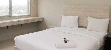 Bedroom 6 Cozy Studio Apartment at Gateway Park LRT City Bekasi By Travelio