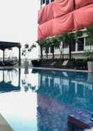 SWIMMING_POOL Cozy Studio Apartment at Gateway Park LRT City Bekasi By Travelio