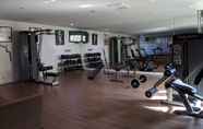 Fitness Center 6 Relaxing and Cozy Studio at The Square Surabaya Apartment By Travelio