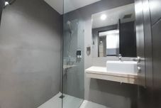 In-room Bathroom Cozy Studio Room Apartment at Patraland Amarta By Travelio