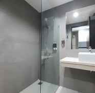 In-room Bathroom 3 Cozy Studio Room Apartment at Patraland Amarta By Travelio