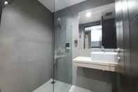 In-room Bathroom Cozy Studio Room Apartment at Patraland Amarta By Travelio