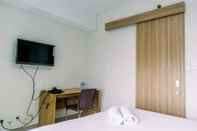 Common Space Comfortable and Elegant 1BR Apartment Bintaro Embarcadero By Travelio