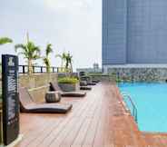 Swimming Pool 6 Comfortable and Elegant 1BR Apartment Bintaro Embarcadero By Travelio