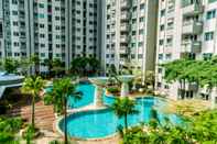 Swimming Pool Comfy and Stunning 2BR at Sky Terrace Apartment By Travelio