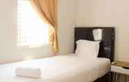 Bedroom 6 Tranquil and Warm 2BR at Springlake Summarecon Bekasi Apartment By Travelio