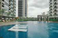 Swimming Pool Cozy and Fully Furnished Studio at Green Sedayu Apartment By Travelio