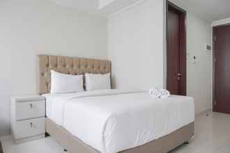 Bedroom 4 Cozy and Fully Furnished Studio at Green Sedayu Apartment By Travelio