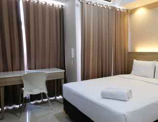 Kamar Tidur 2 Compact and Best Choice Studio at Apartment Taman Melati Surabaya By Travelio