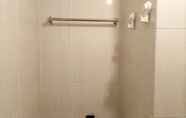 In-room Bathroom 3 Tidy and Comfortable Studio at Barsa City Apartment By Travelio