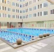 Swimming Pool 2 Cozy Studio at Emerald Towers Apartment Bandung By Travelio