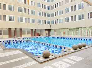 Swimming Pool 4 Cozy Studio at Emerald Towers Apartment Bandung By Travelio