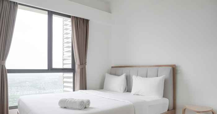 Bedroom High Floor and Homey 2BR at Sky House BSD Apartment By Travelio