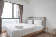 Bedroom High Floor and Homey 2BR at Sky House BSD Apartment By Travelio