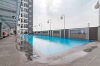 Swimming Pool Comfortable 2BR Apartment Mekarwangi Square Cibaduyut By Travelio