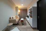 Common Space Spacious and Elegant 1BR at Patraland Amarta Apartment By Travelio