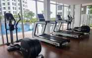 Fitness Center 4 Fully Furnished and Cozy 1BR at M-Town Signature Apartment By Travelio