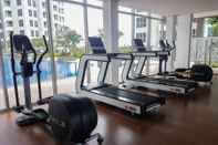 Fitness Center Fully Furnished and Cozy 1BR at M-Town Signature Apartment By Travelio