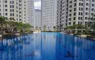 Swimming Pool 6 Fully Furnished and Cozy 1BR at M-Town Signature Apartment By Travelio