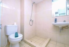 In-room Bathroom 4 Warm and Best Choice  Studio at Springlake Summarecon Bekasi Apartment By Travelio